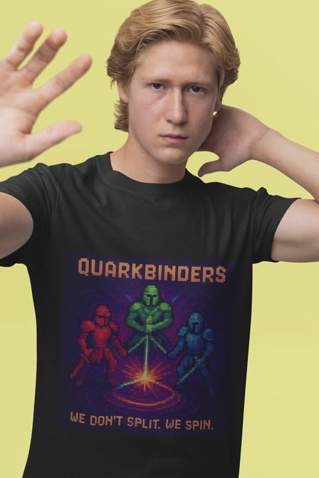 Quarkbinders pixel-art tee by Pixelated Physics, three colour-charged quark characters locked together by the strong force