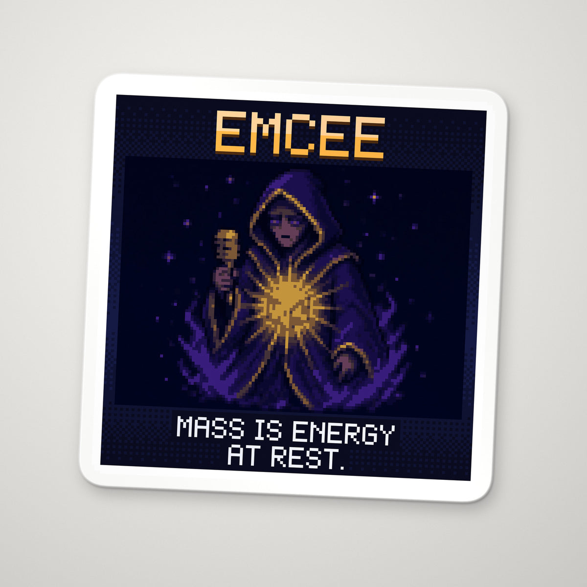 Pixel-art sticker of Emcee, personifying Mass–Energy Equivalence, with the caption "Mass Is Energy At Rest."