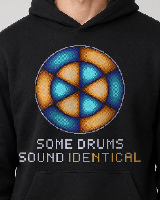 Black Drum Mode physics hoodie, pixel-art circular membrane vibration design, worn by a model, front close-up