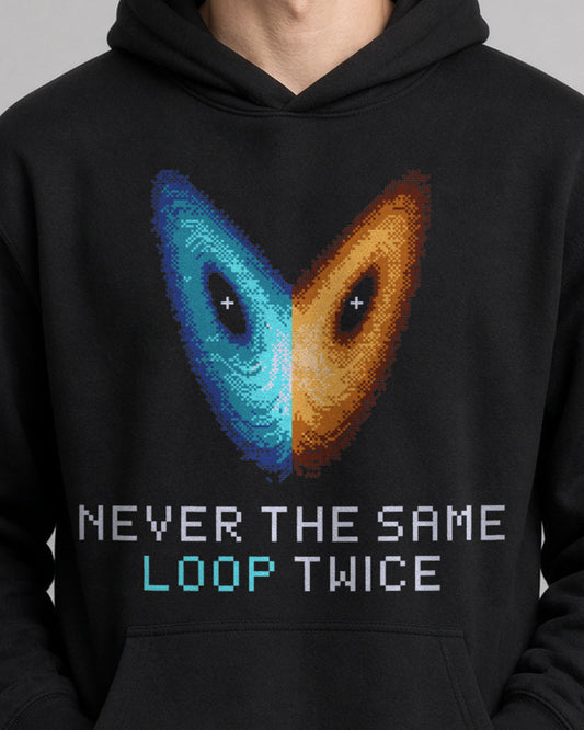 Black Strange Attractor physics hoodie, pixel-art Lorenz attractor design, worn by a model, front close-up