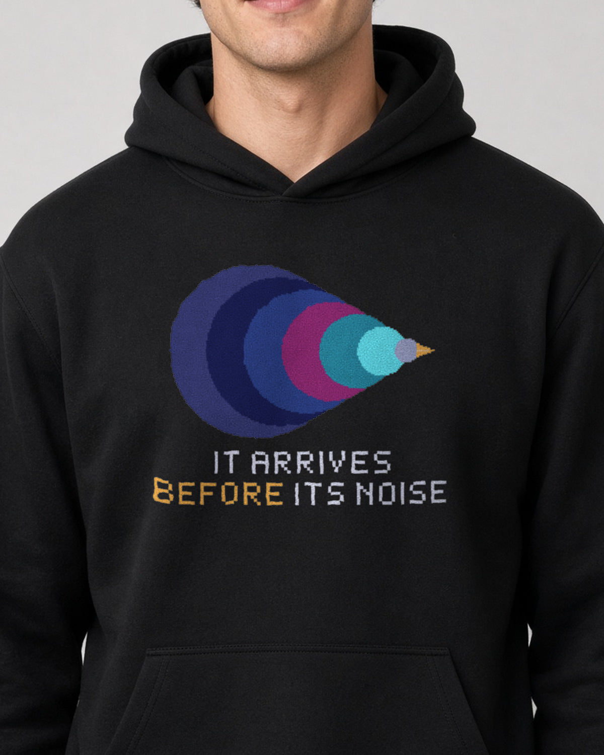 Black Mach Cone physics hoodie, pixel-art Mach cone shock wave design, worn by a model, front close-up