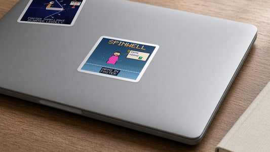 Spinwell pixel-art physics sticker on a laptop