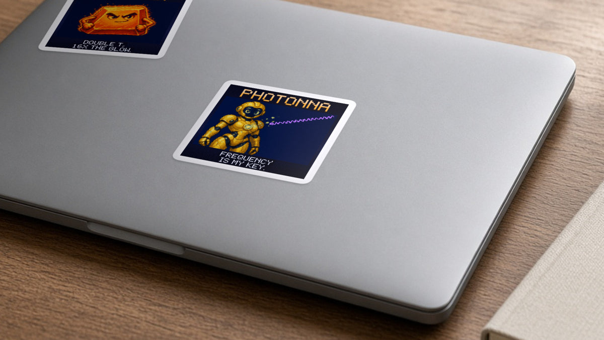 Photonna pixel-art physics sticker on a laptop