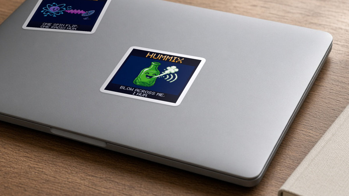 Hummix pixel-art physics sticker on a laptop