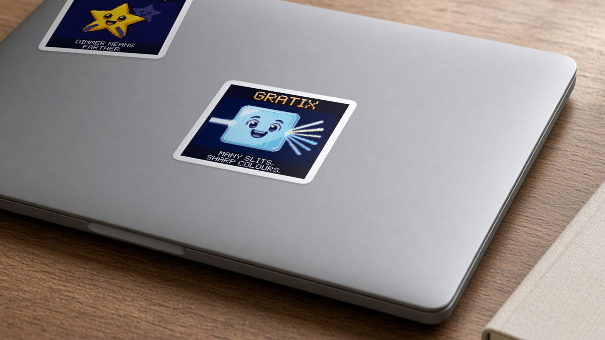 Gratix pixel-art physics sticker on a laptop