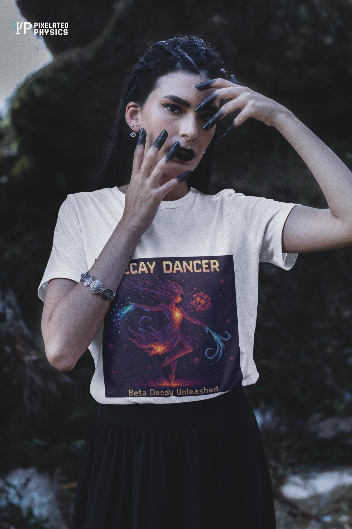 White Decay Dancer physics T-shirt, pixel-art beta decay design, worn by a woman