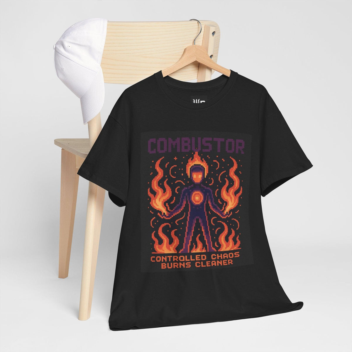 Black Combustor physics T-shirt, pixel-art combustion design, hanging on a chair