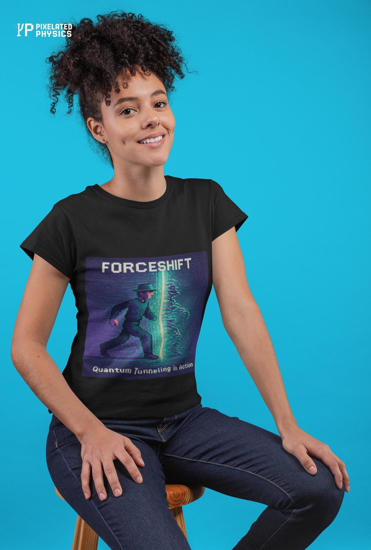 Black ForceShift physics T-shirt, pixel-art quantum tunneling design, worn by a woman