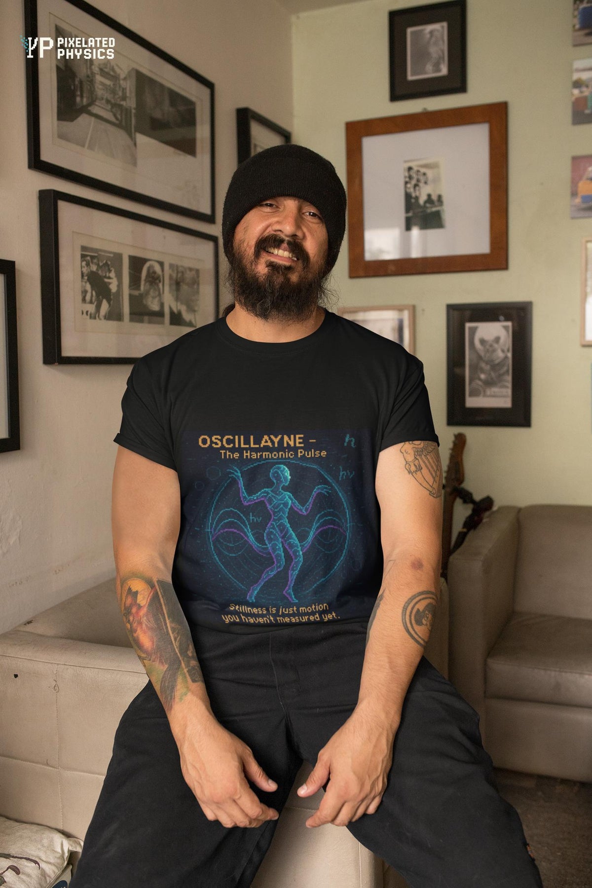 Black Oscillayne physics T-shirt, pixel-art resonance design, worn by a man
