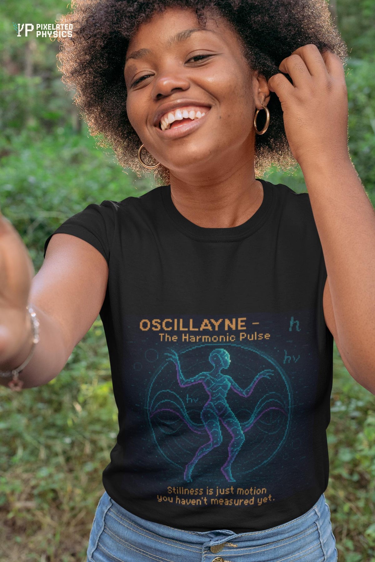 Black Oscillayne physics T-shirt, pixel-art resonance design, worn by a woman