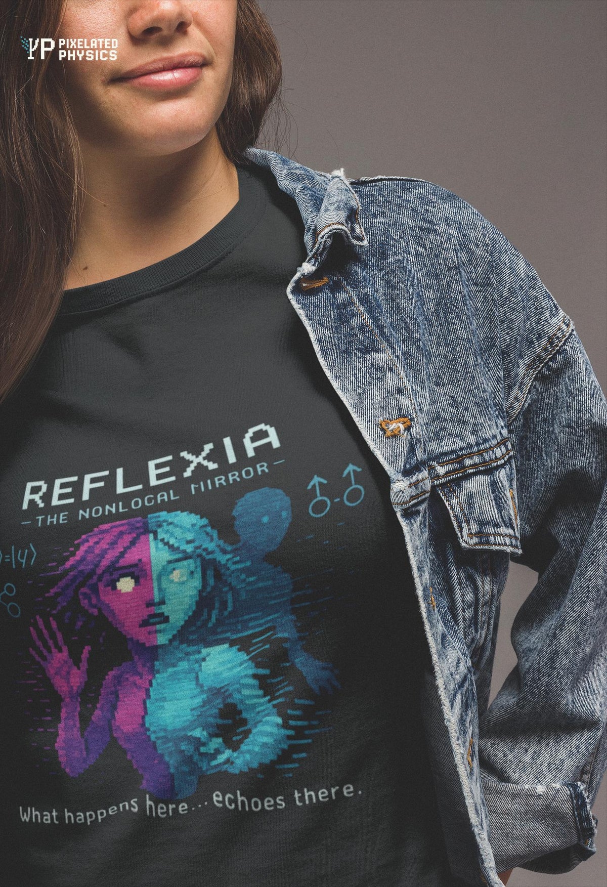 Black Reflexia physics T-shirt, pixel-art quantum nonlocality design, worn by a woman