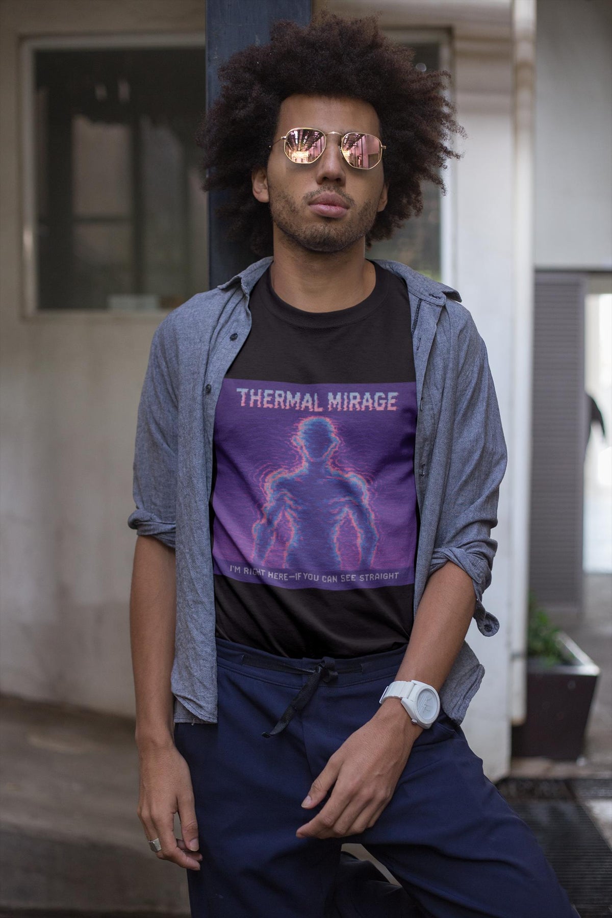Black Thermal Mirage physics T-shirt, pixel-art mirage refraction design, worn by a man