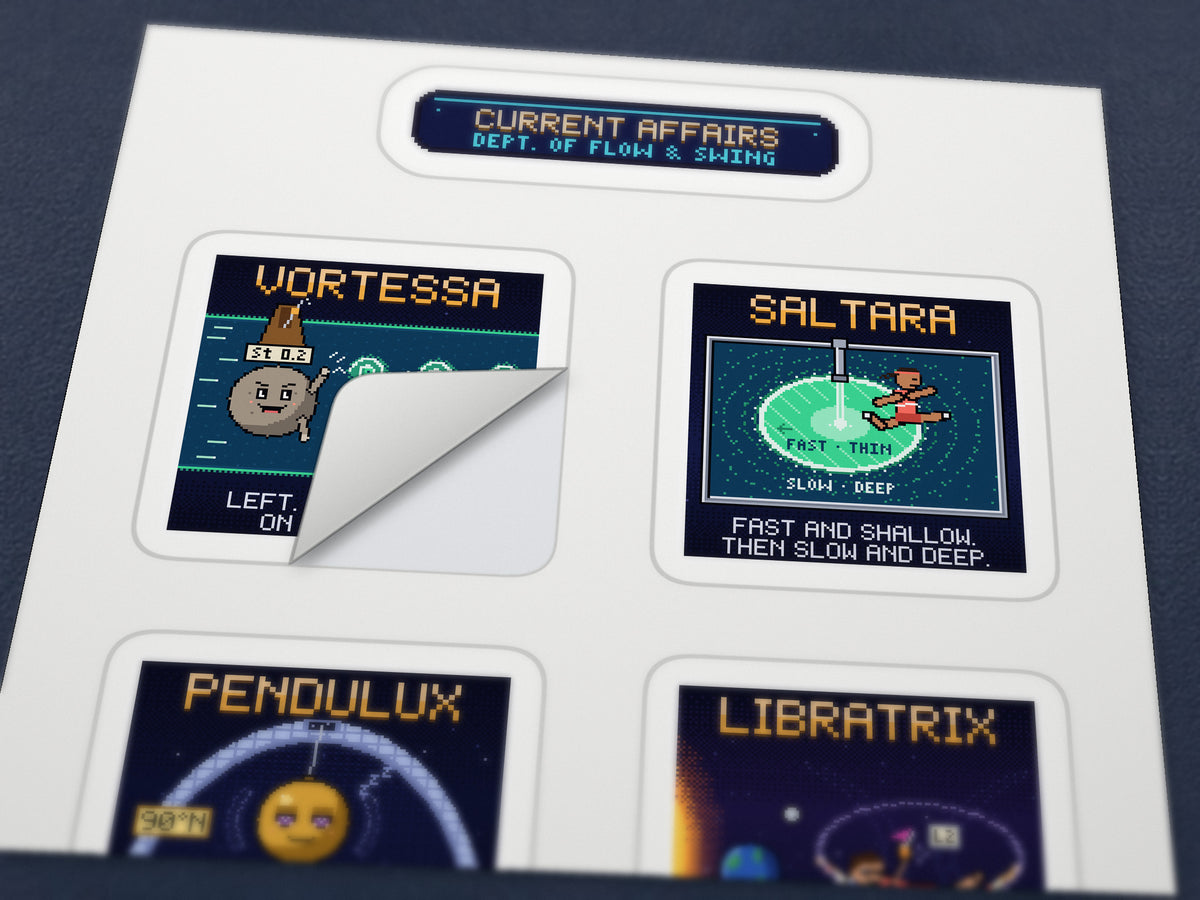 Close-up of a navy pixel-art sticker being peeled from the white Current Affairs sticker sheet