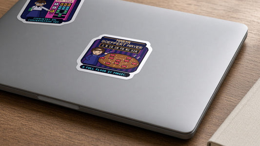 Maria Goeppert Mayer pixel-art physics sticker on a laptop