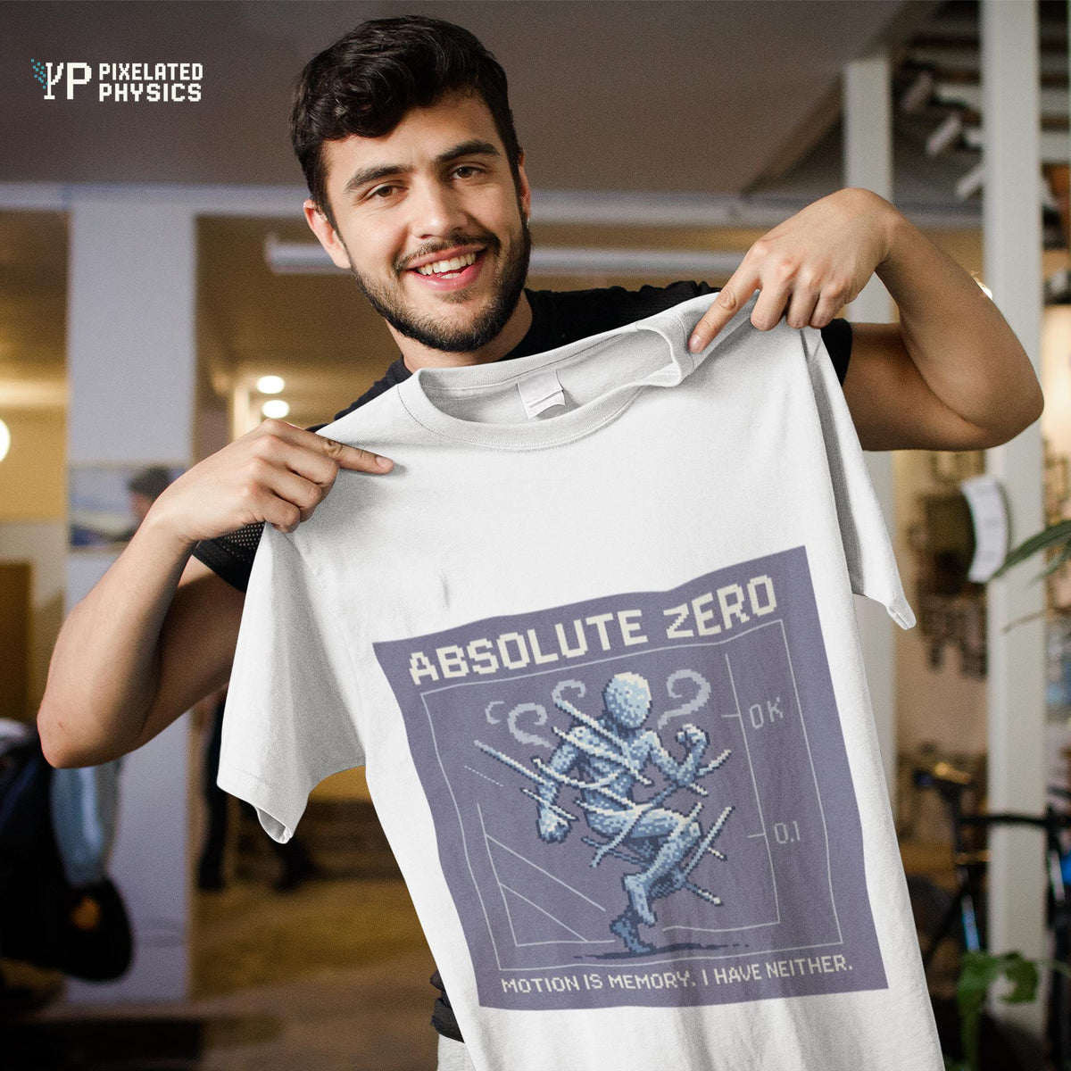 White Absolute Zero physics T-shirt, pixel-art absolute zero, 0 kelvin design, worn by a man holding the shirt