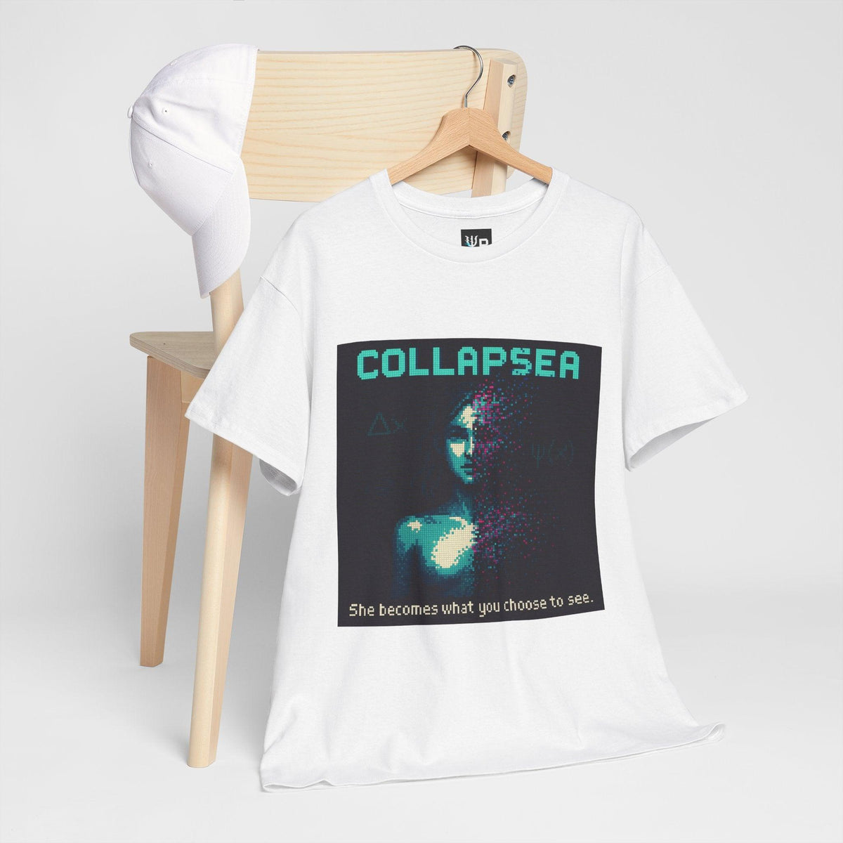 White Collapsea physics T-shirt, pixel-art wave function collapse design, hanging on a chair
