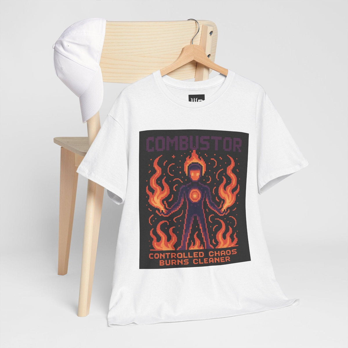 White Combustor physics T-shirt, pixel-art combustion design, hanging on a chair