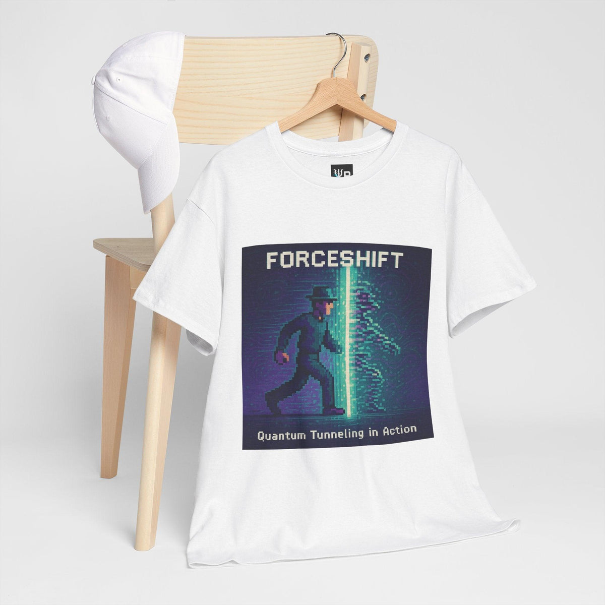 White ForceShift physics T-shirt, pixel-art quantum tunneling design, hanging on a chair