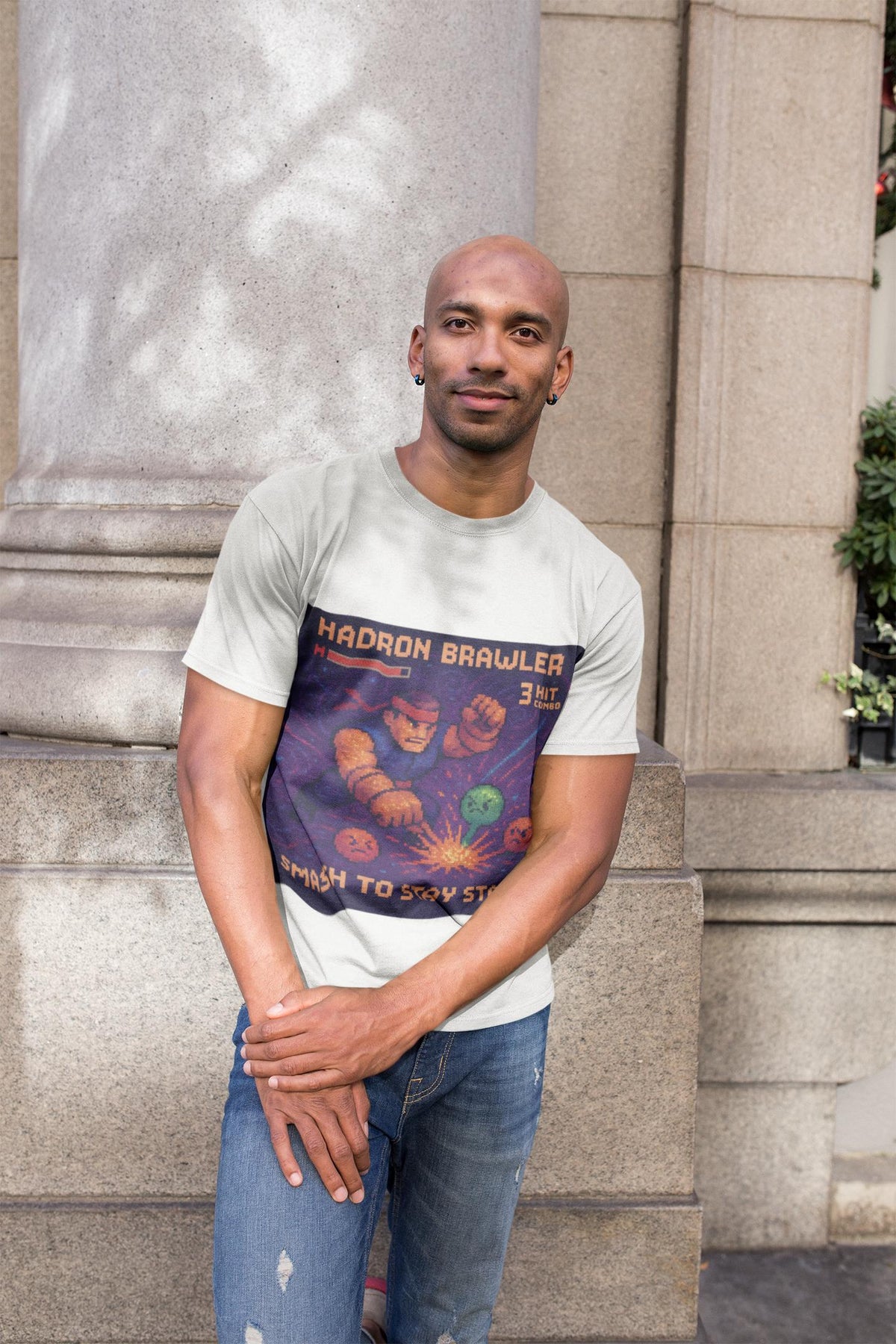 White Hadron Brawler physics T-shirt, pixel-art strong force, quark confinement design, worn by a man