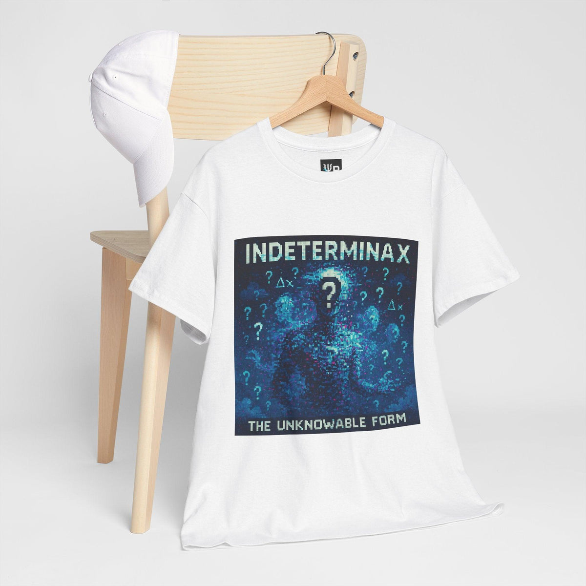 White Indeterminax physics T-shirt, pixel-art uncertainty principle design, hanging on a chair