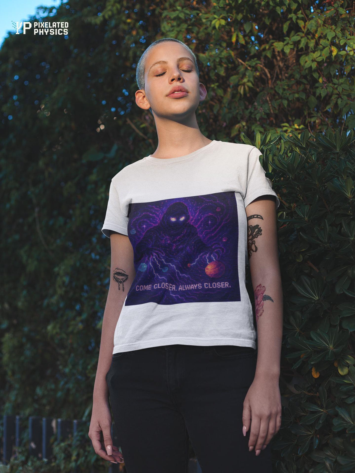 White The Lurker physics T-shirt, pixel-art general relativity design, worn by a woman