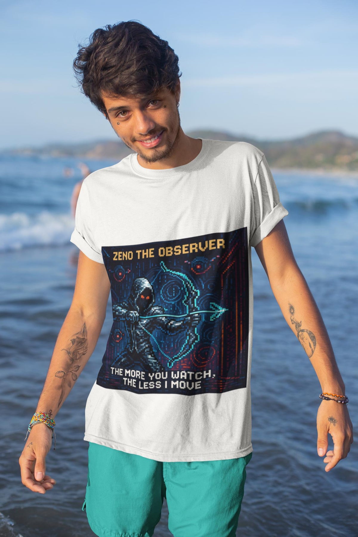 White Zeno physics T-shirt, pixel-art quantum Zeno effect design, worn by a man at the beach